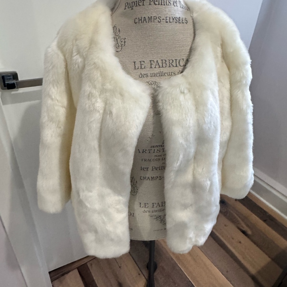 Calvin Klein bolero jacket.
